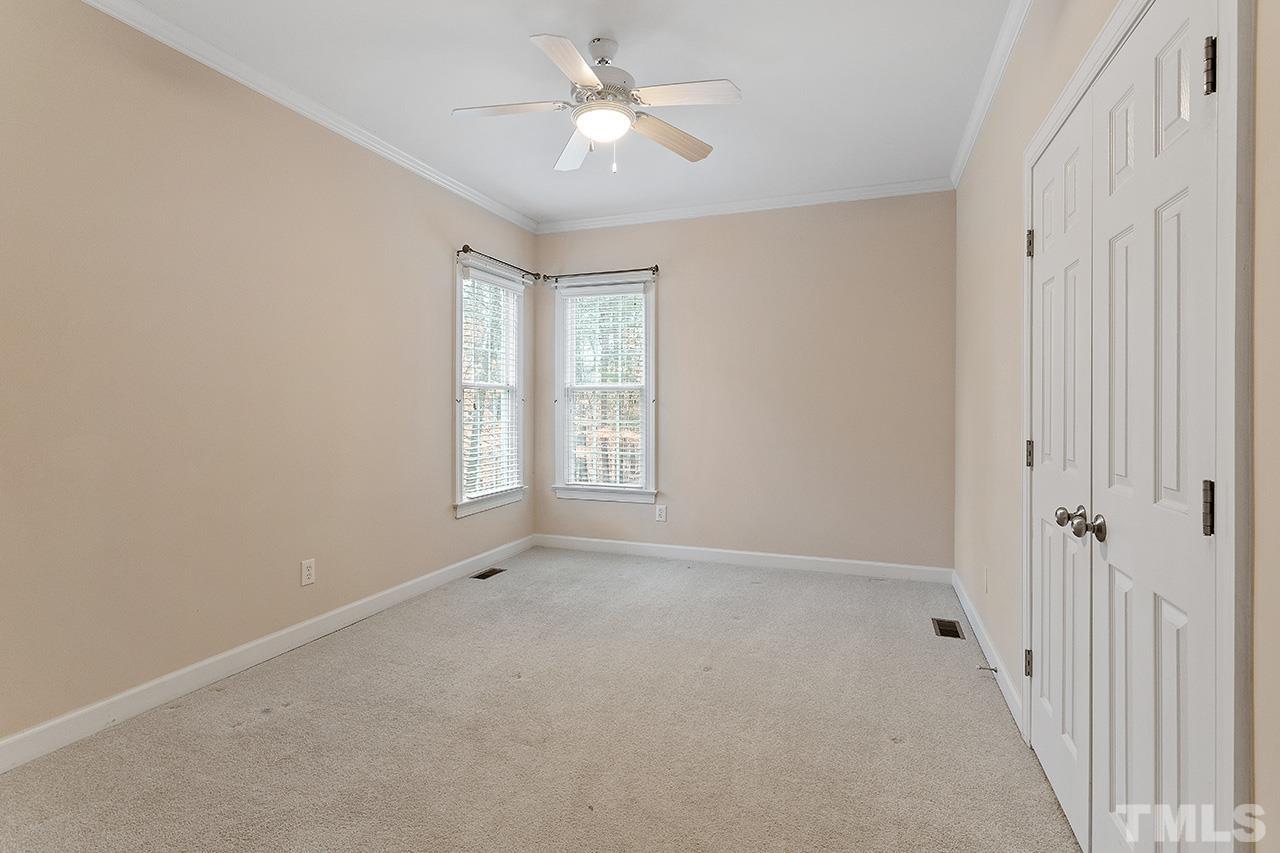 12724 Amoretto Way Raleigh, NC 27613 - Photo 24 of 44 a view of an empty room with a window