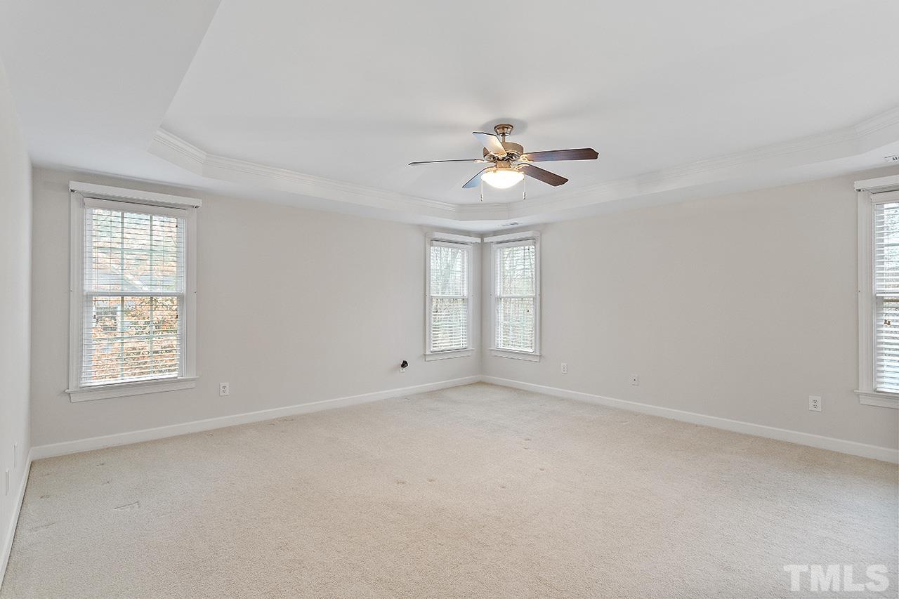 12724 Amoretto Way Raleigh, NC 27613 - Photo 28 of 44 a view of an empty room with a window