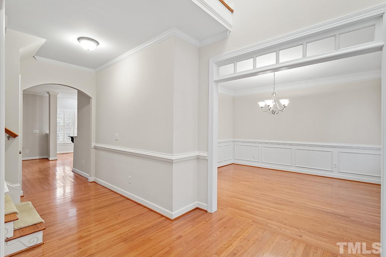 12724 Amoretto Way Raleigh, NC 27613 - Photo 3 of 44 wooden floor in an empty room with a window