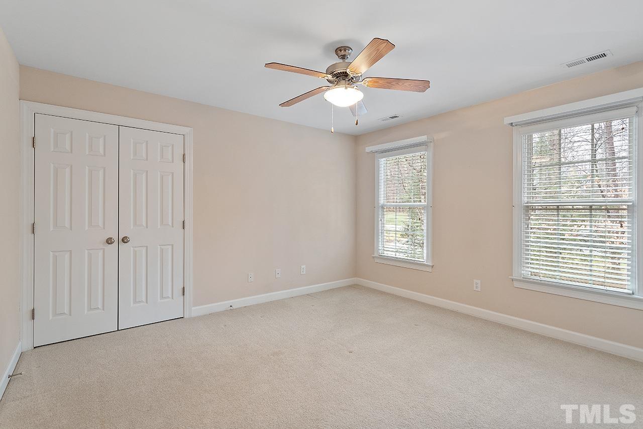 12724 Amoretto Way Raleigh, NC 27613 - Photo 34 of 44 a view of an empty room with a window
