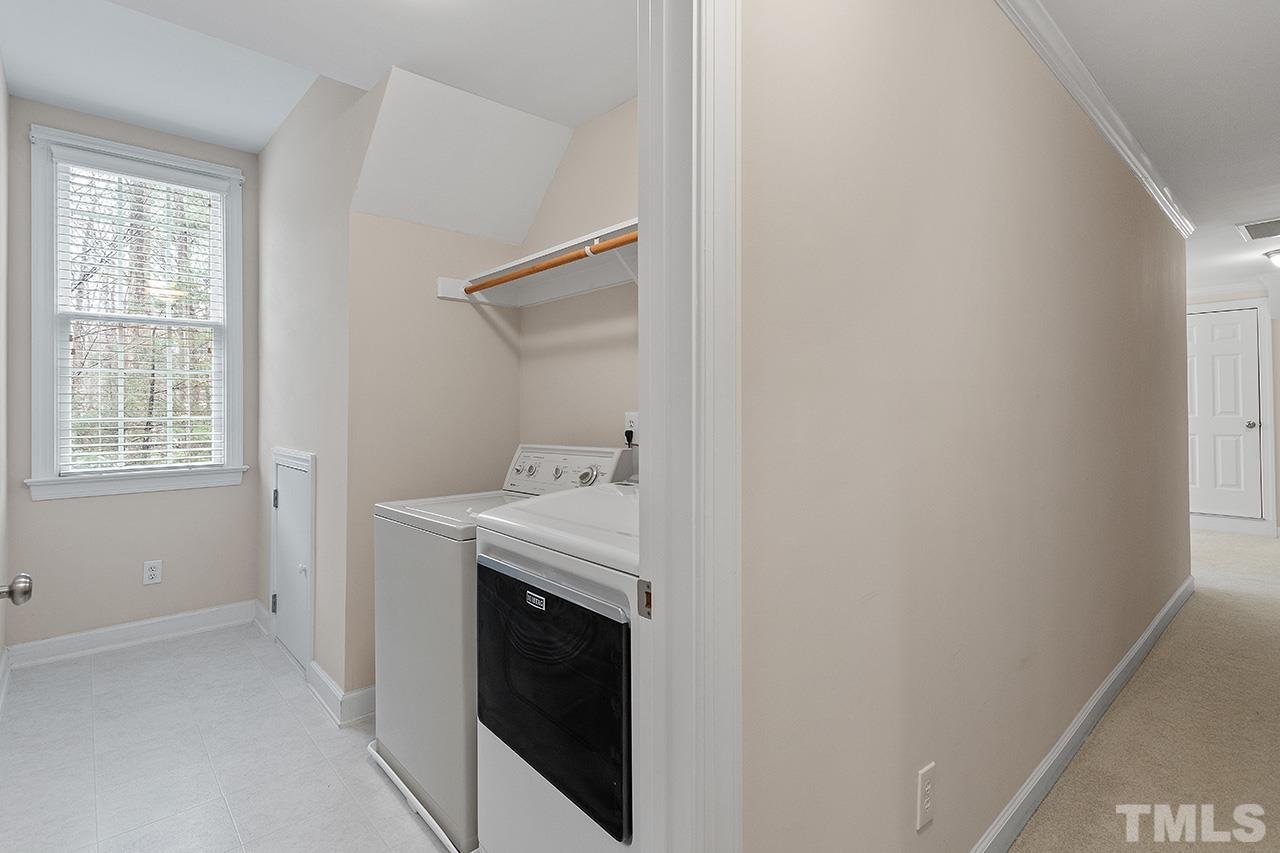 12724 Amoretto Way Raleigh, NC 27613 - Photo 36 of 44 a view of empty room with washer and dryer