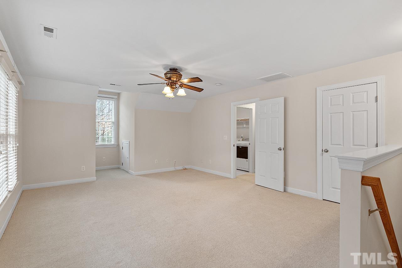 12724 Amoretto Way Raleigh, NC 27613 - Photo 38 of 44 a view of an empty room with a window