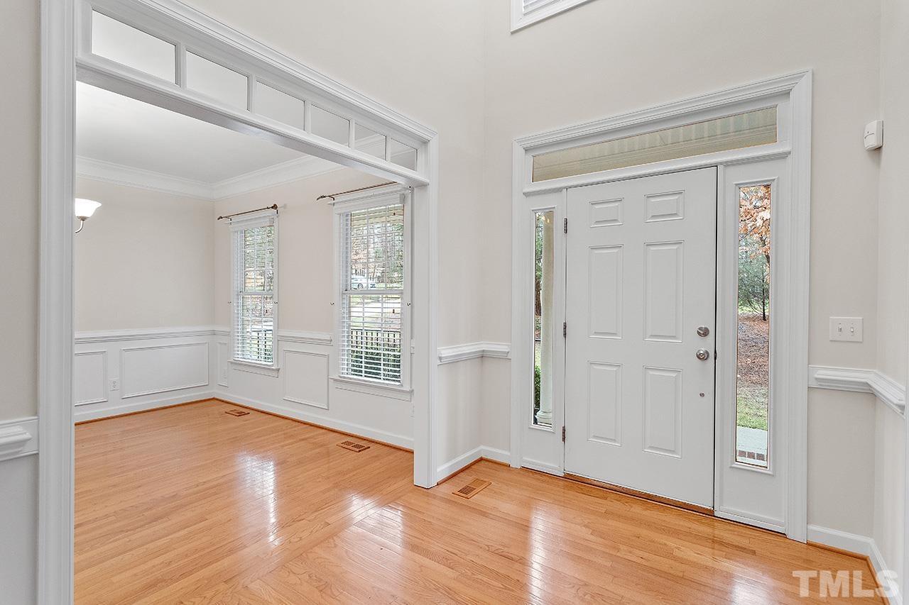 12724 Amoretto Way Raleigh, NC 27613 - Photo 5 of 44 wooden floor in an empty room with a window