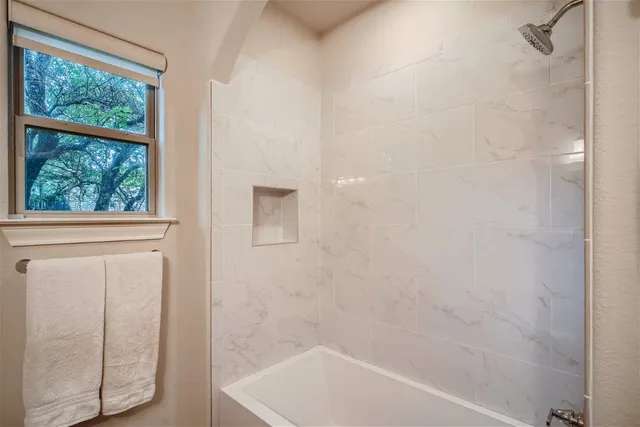 a bathroom with a bathtub