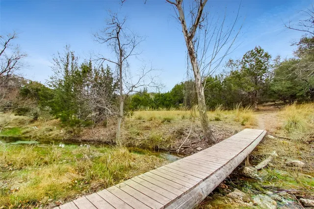 a view of a lake with a bench