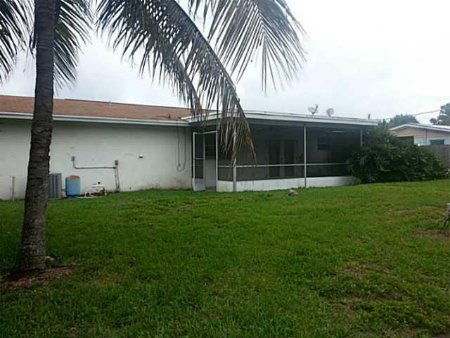 2080 Southeast Madison Street Stuart, FL 34997 - Photo 25 of 25 a view of a backyard