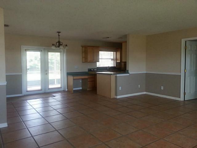 2080 Southeast Madison Street Stuart, FL 34997 - Photo 4 of 25 a view of a kitchen with a sink and a window
