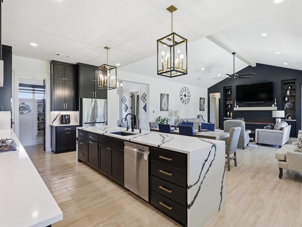 2016 Sonora Way Poolville, TX 76487 - Photo 12 of 40 a large kitchen with stainless steel appliances lots of counter space