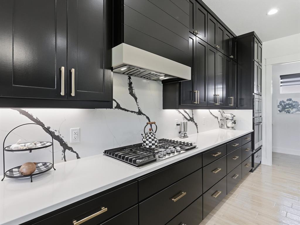 2016 Sonora Way Poolville, TX 76487 - Photo 13 of 40 a kitchen with a sink and cabinets