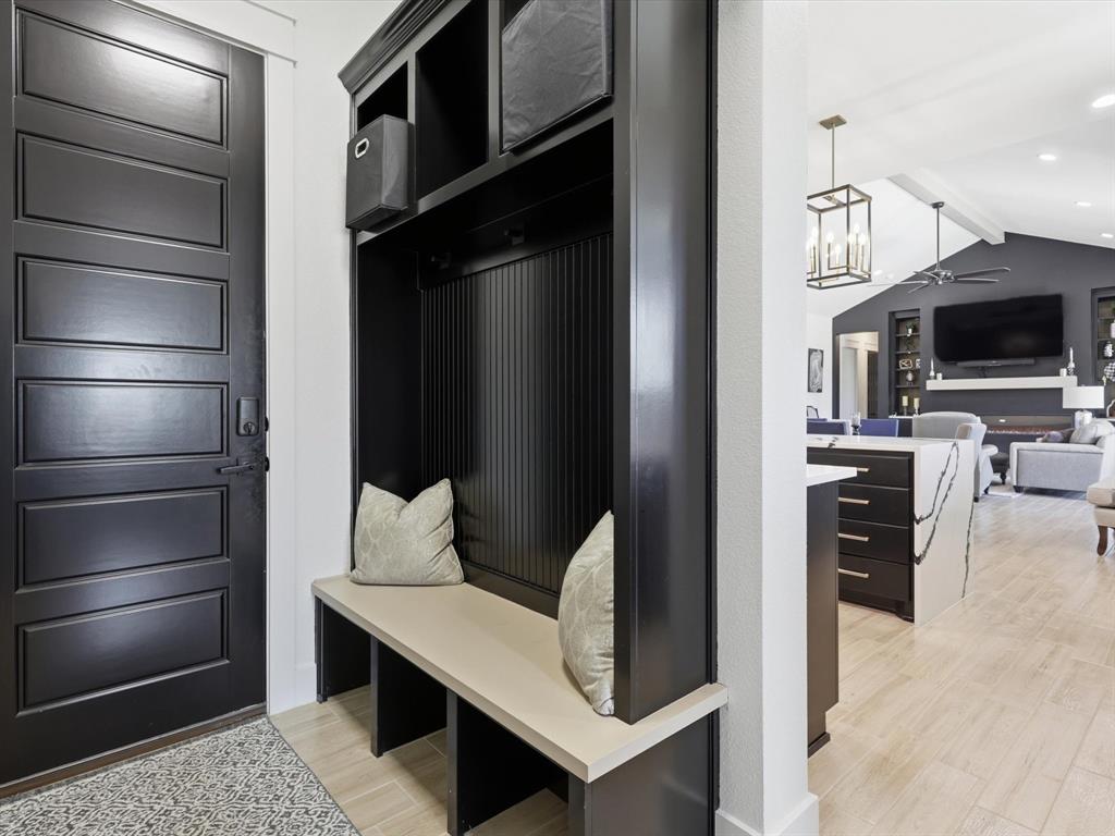 2016 Sonora Way Poolville, TX 76487 - Photo 23 of 40 a kitchen with stainless steel appliances kitchen island granite countertop a refrigerator and a stove top oven