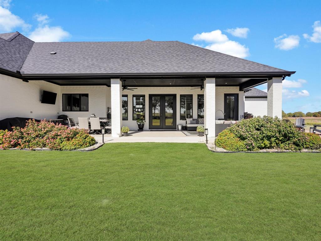 2016 Sonora Way Poolville, TX 76487 - Photo 36 of 40 a view of a house with garden