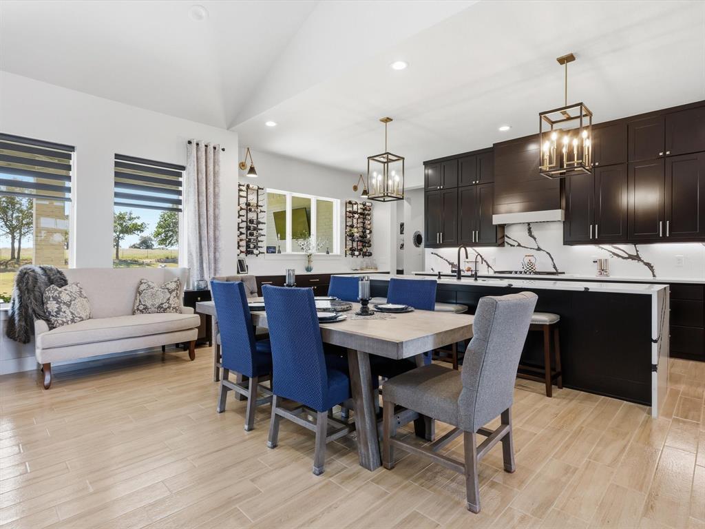 2016 Sonora Way Poolville, TX 76487 - Photo 7 of 40 a view of a dining room with furniture window and wooden floor