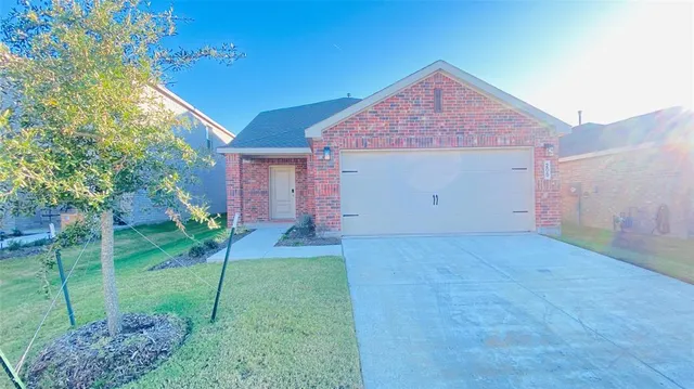 a house view with a backyard space