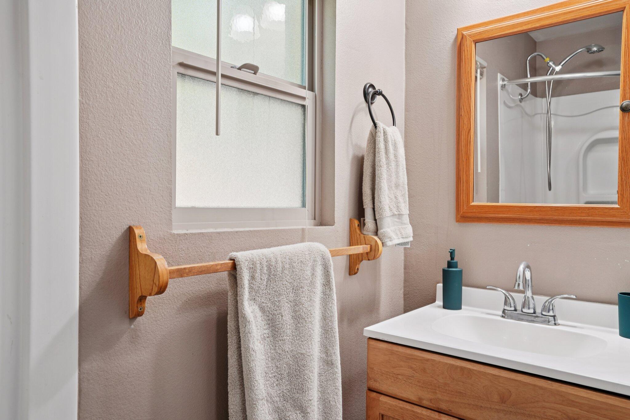 25140 Lodge Road Idyllwild, CA 92549 - Photo 14 of 35 a bathroom with a sink and a mirror