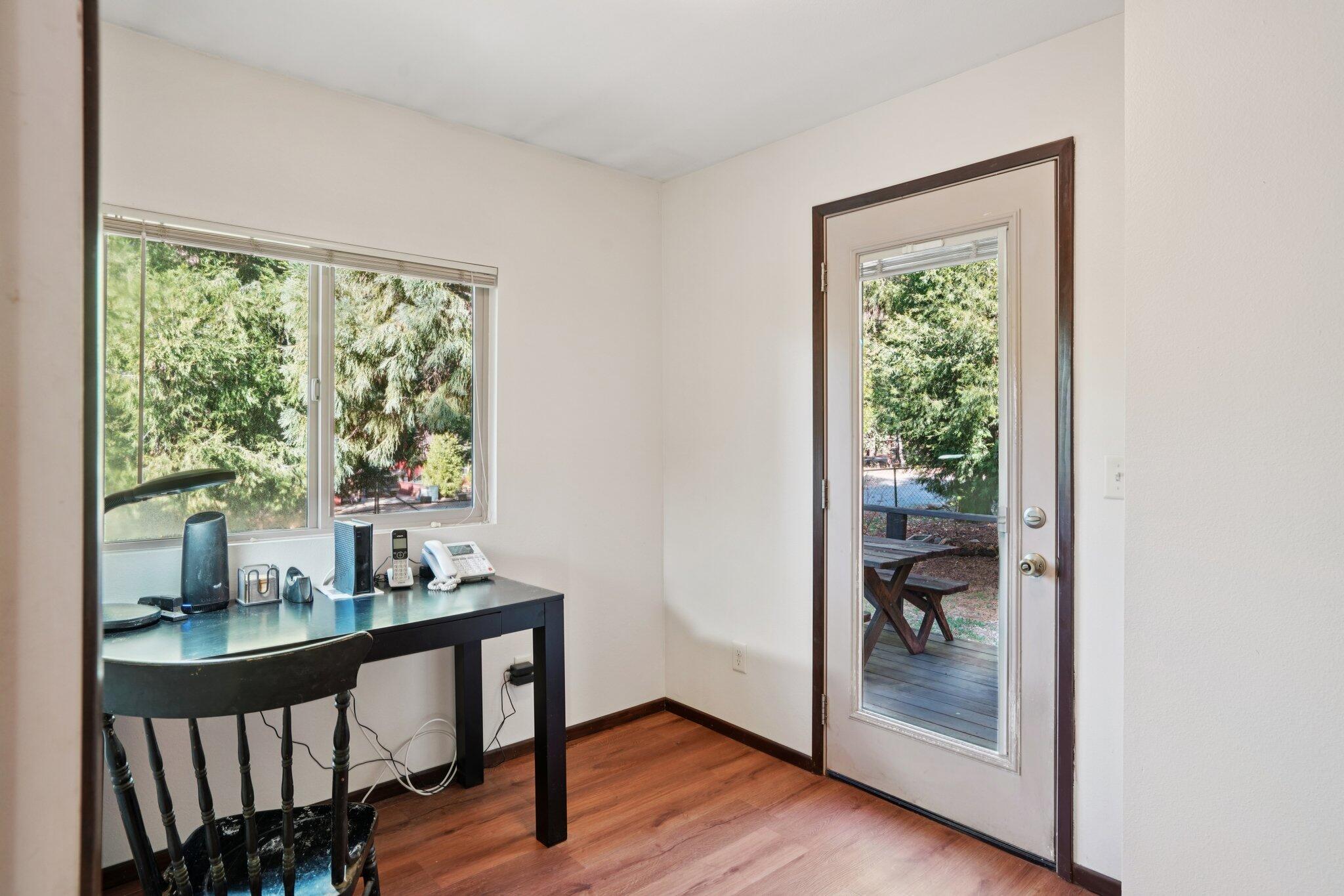 25140 Lodge Road Idyllwild, CA 92549 - Photo 15 of 35 a view of room with window and wooden floor