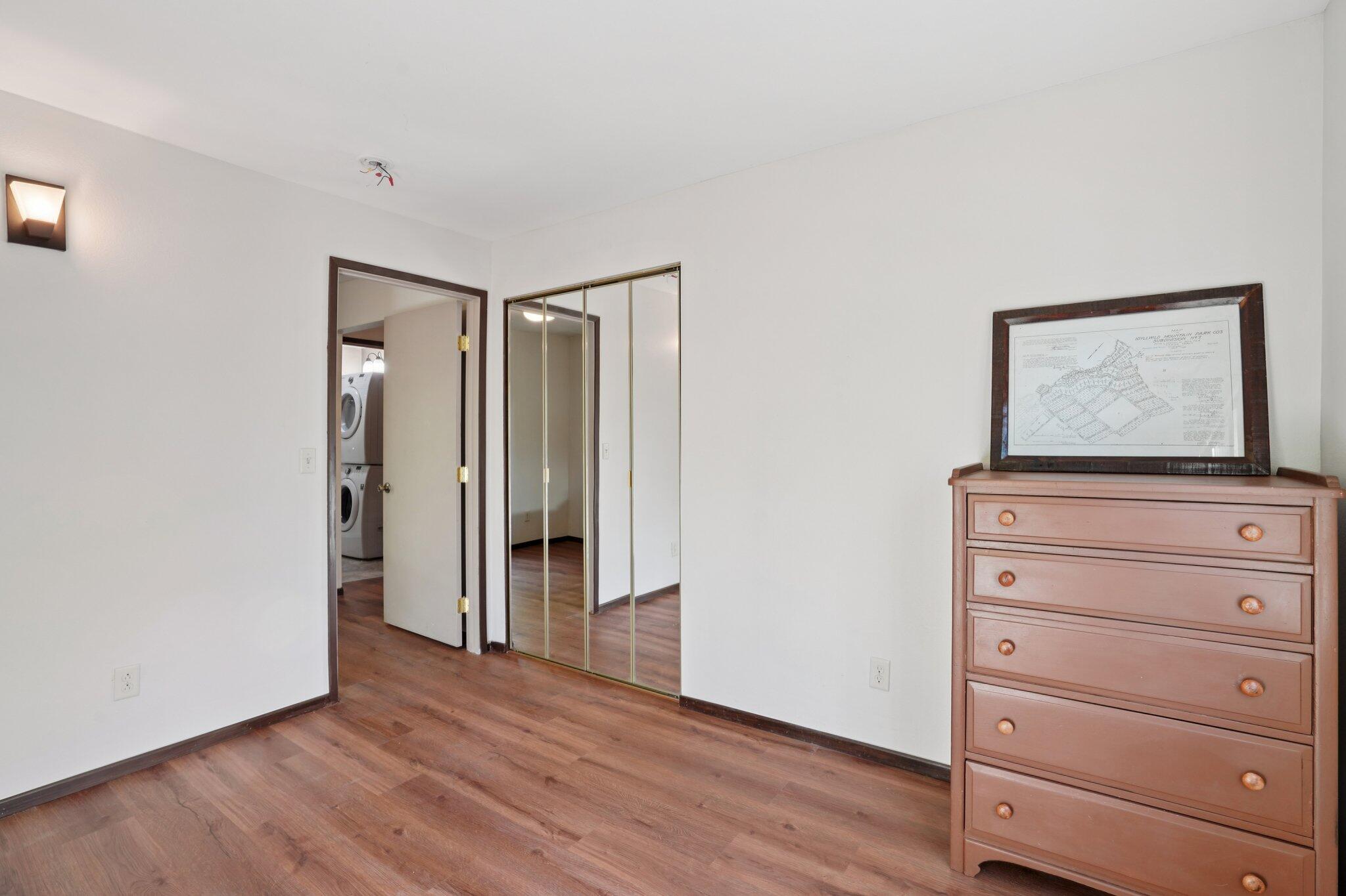 25140 Lodge Road Idyllwild, CA 92549 - Photo 19 of 35 wooden floor in an empty room
