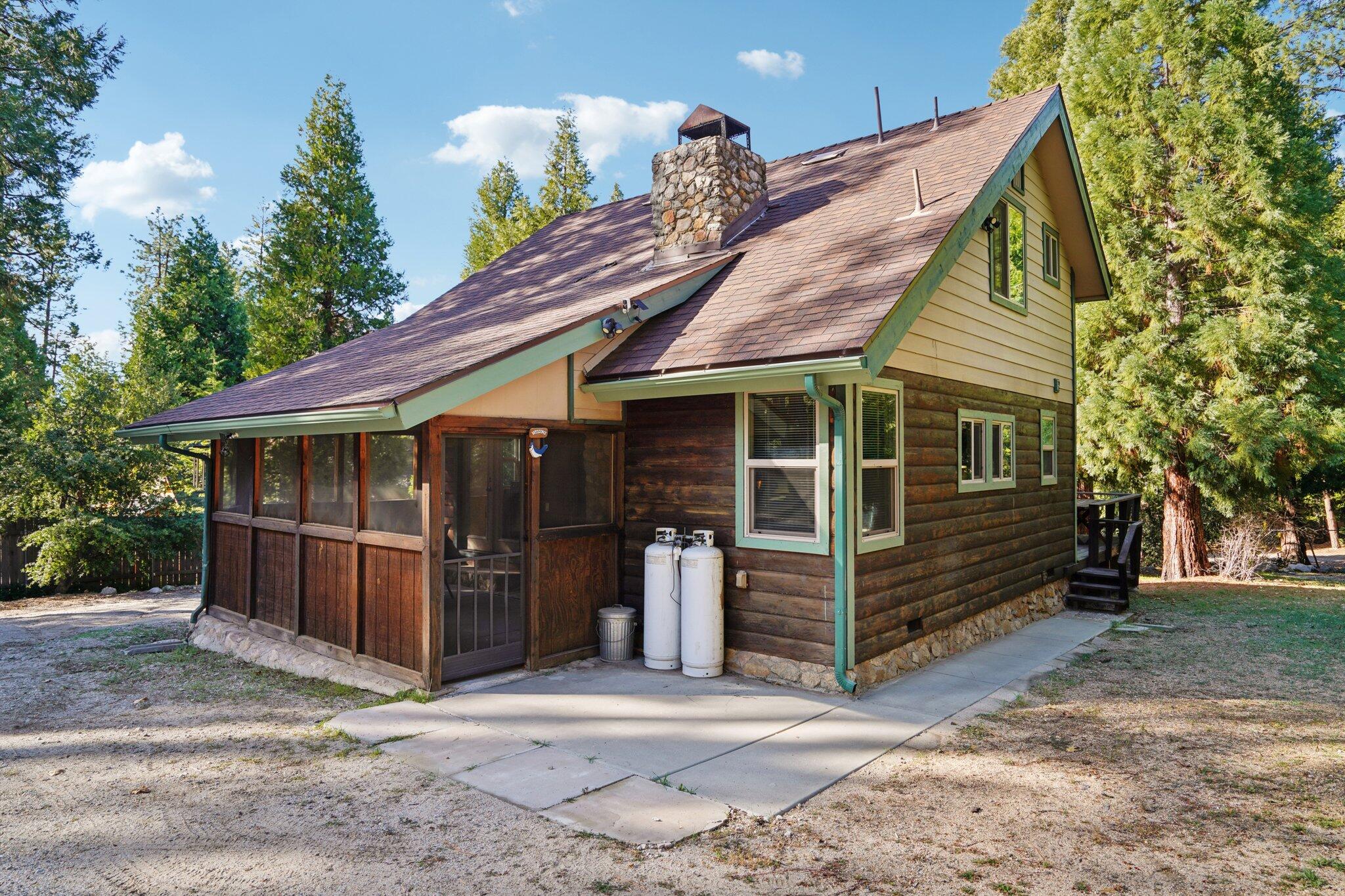 25140 Lodge Road Idyllwild, CA 92549 - Photo 33 of 35 a front view of a house with a porch