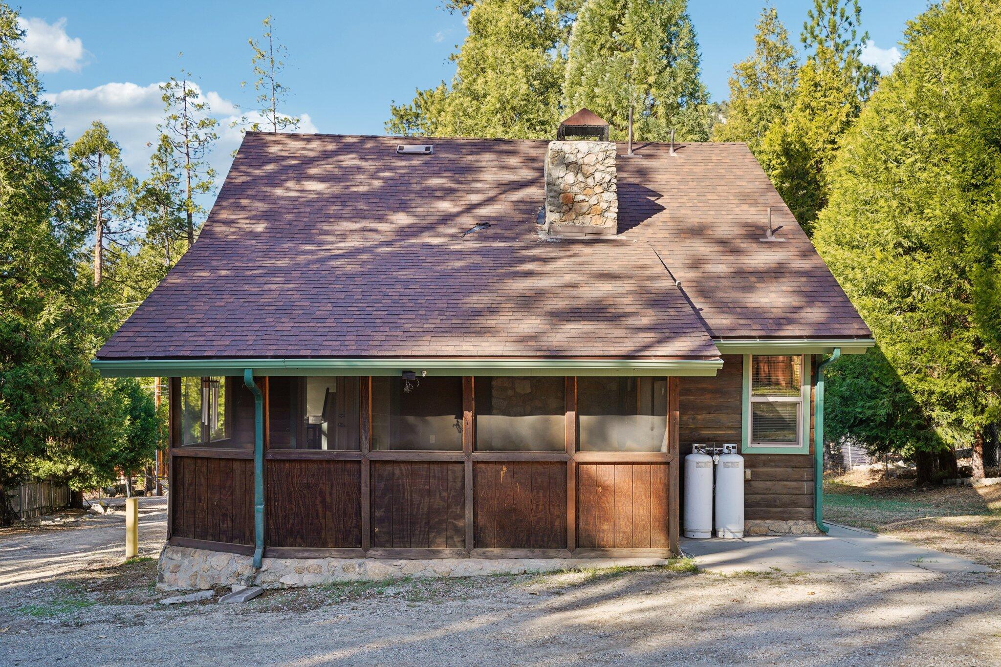 25140 Lodge Road Idyllwild, CA 92549 - Photo 35 of 35 a front view of a house with a garden