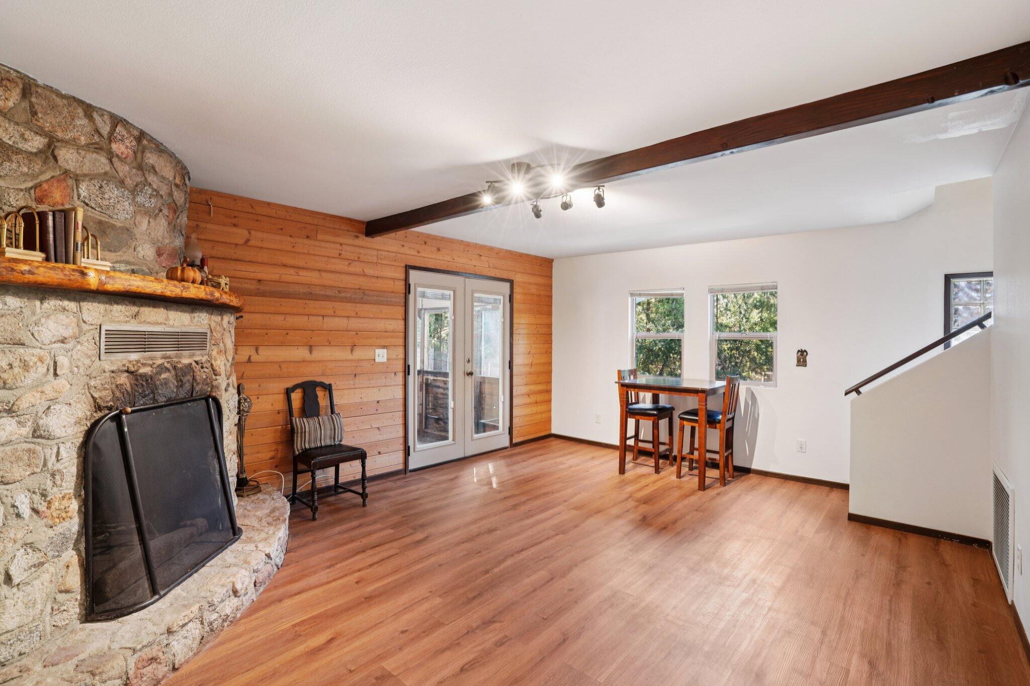 25140 Lodge Road Idyllwild, CA 92549 - Photo 5 of 35 a living room with furniture and a fireplace