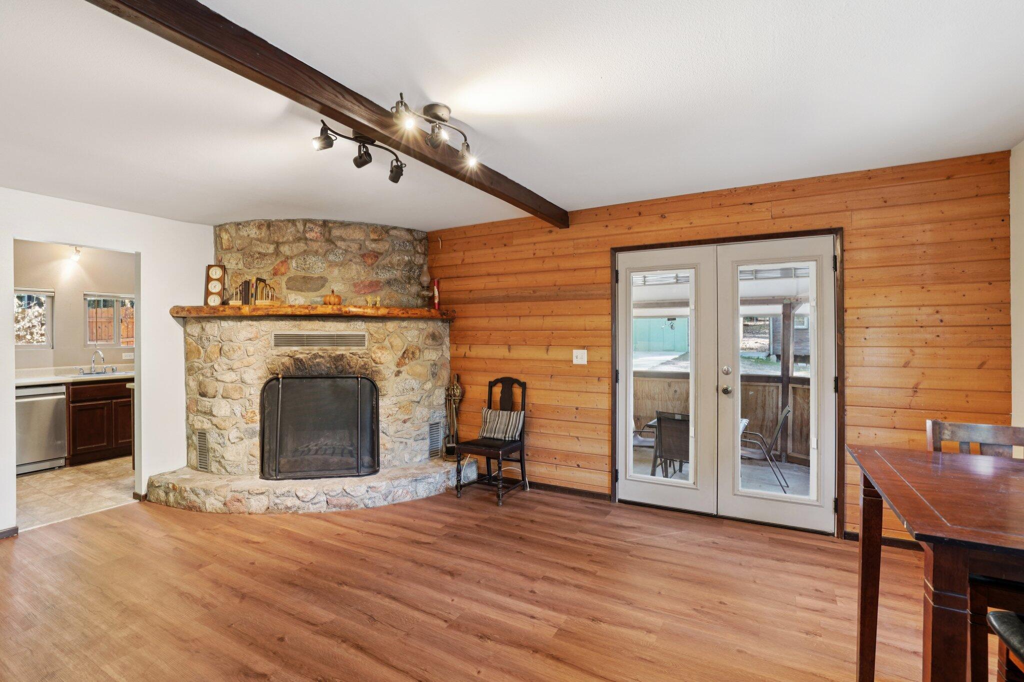 25140 Lodge Road Idyllwild, CA 92549 - Photo 6 of 35 a view of a livingroom with a fireplace and furniture