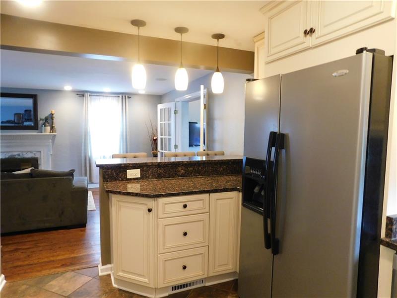 The island adds much needed counter space and cabinets.