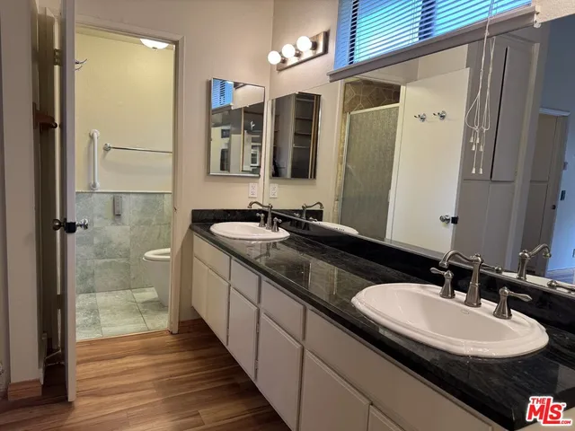 a bathroom with a toilet and a sink