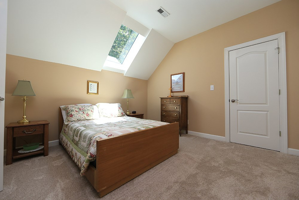 5800 Valley Mist Court Raleigh, NC 27613 - Photo 27 of 30 Carpeted, walk-in closet, private full bath down the hall 2nd floor Guest Bedroom