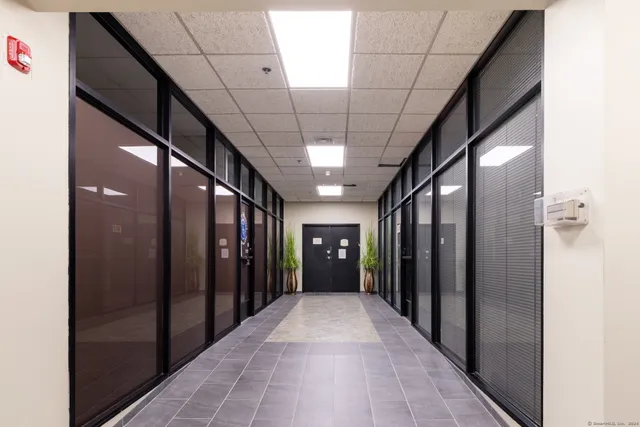 a view of gallery with hallway