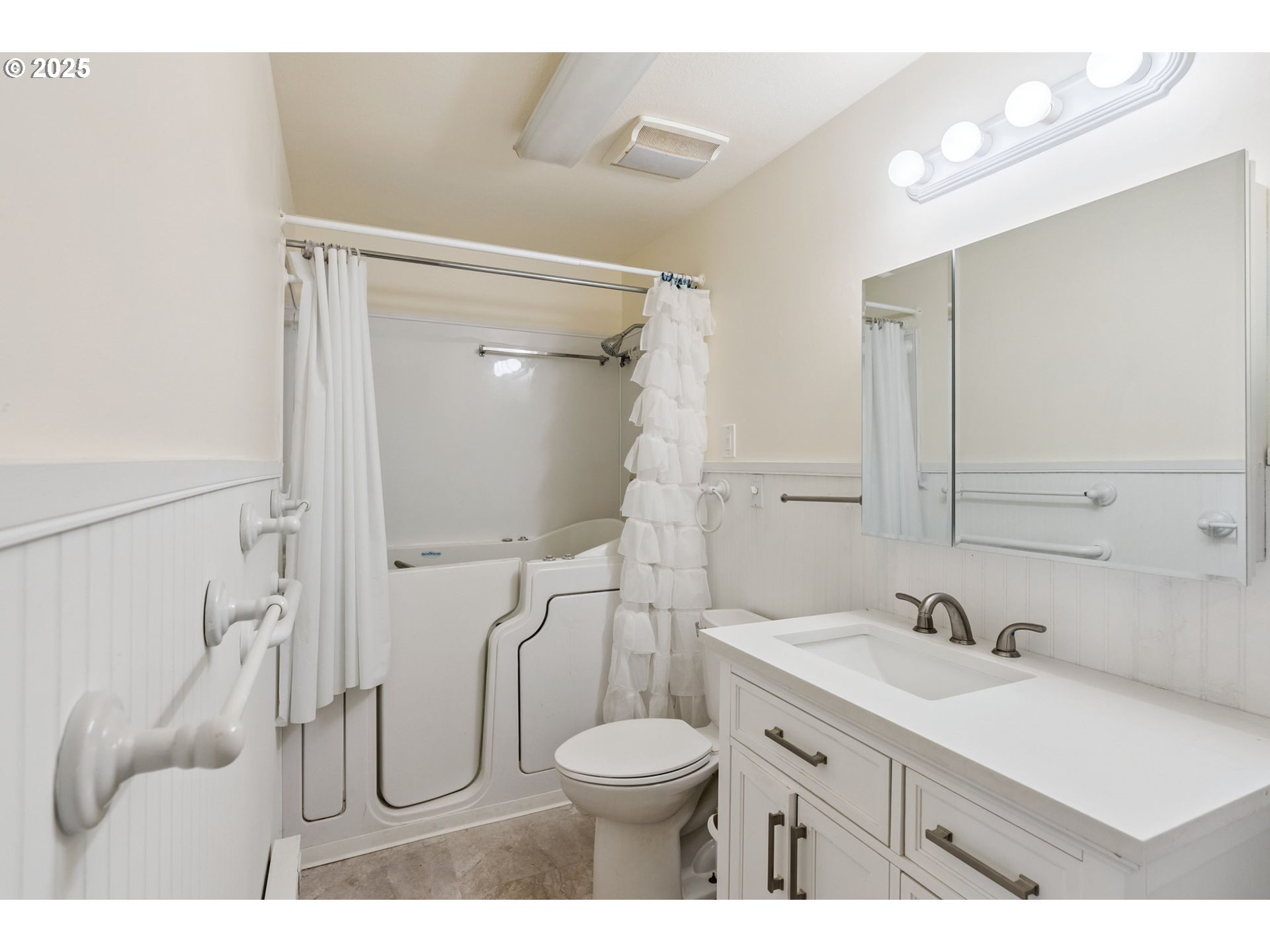 1108 9th Street Hood River, OR 97031 - Photo 20 of 44 a bathroom with a sink toilet vanity and shower