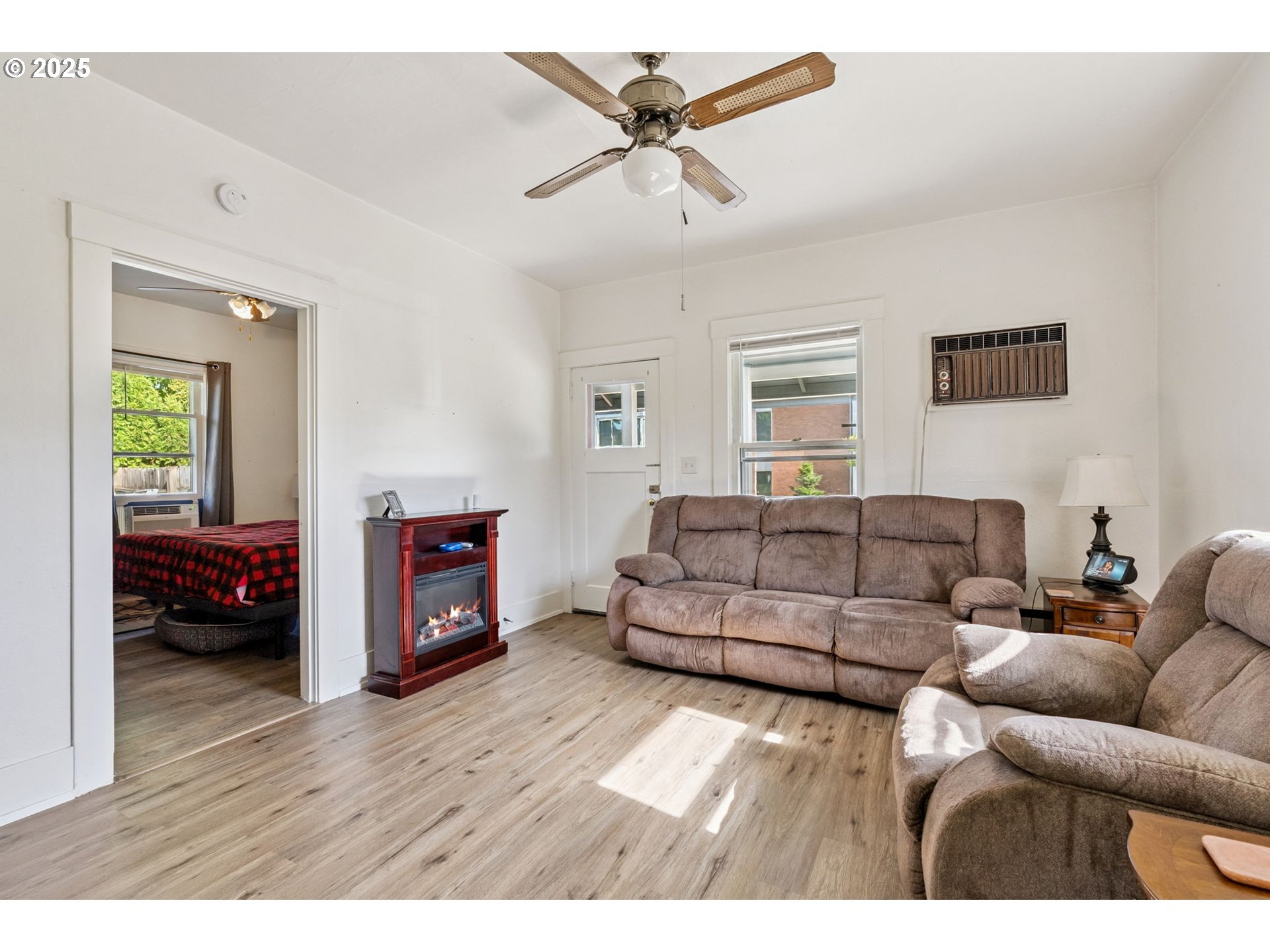 1108 9th Street Hood River, OR 97031 - Photo 23 of 44 a living room with furniture and a wooden floor