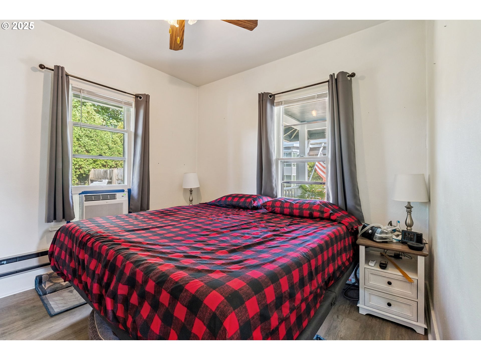 1108 9th Street Hood River, OR 97031 - Photo 27 of 44 a bedroom with a bed and a window