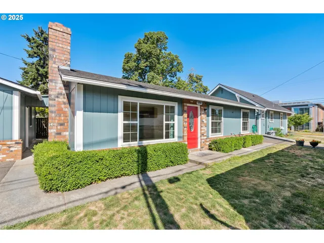 front view of a house with a yard