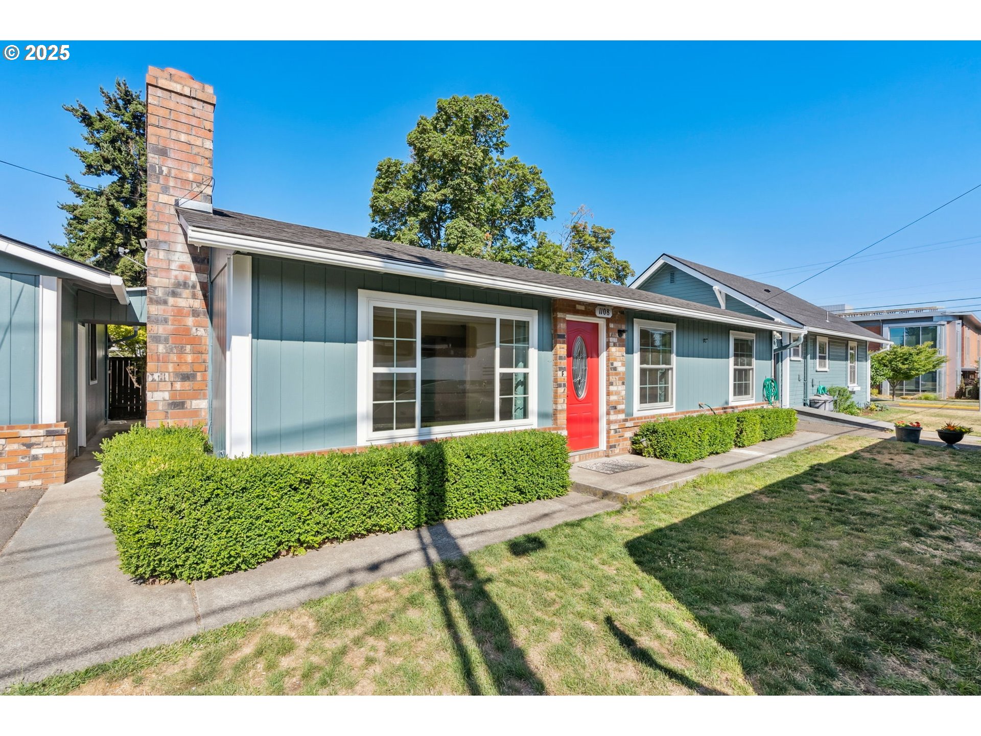 1108 9th Street Hood River, OR 97031 - Photo 3 of 44 front view of a house with a yard