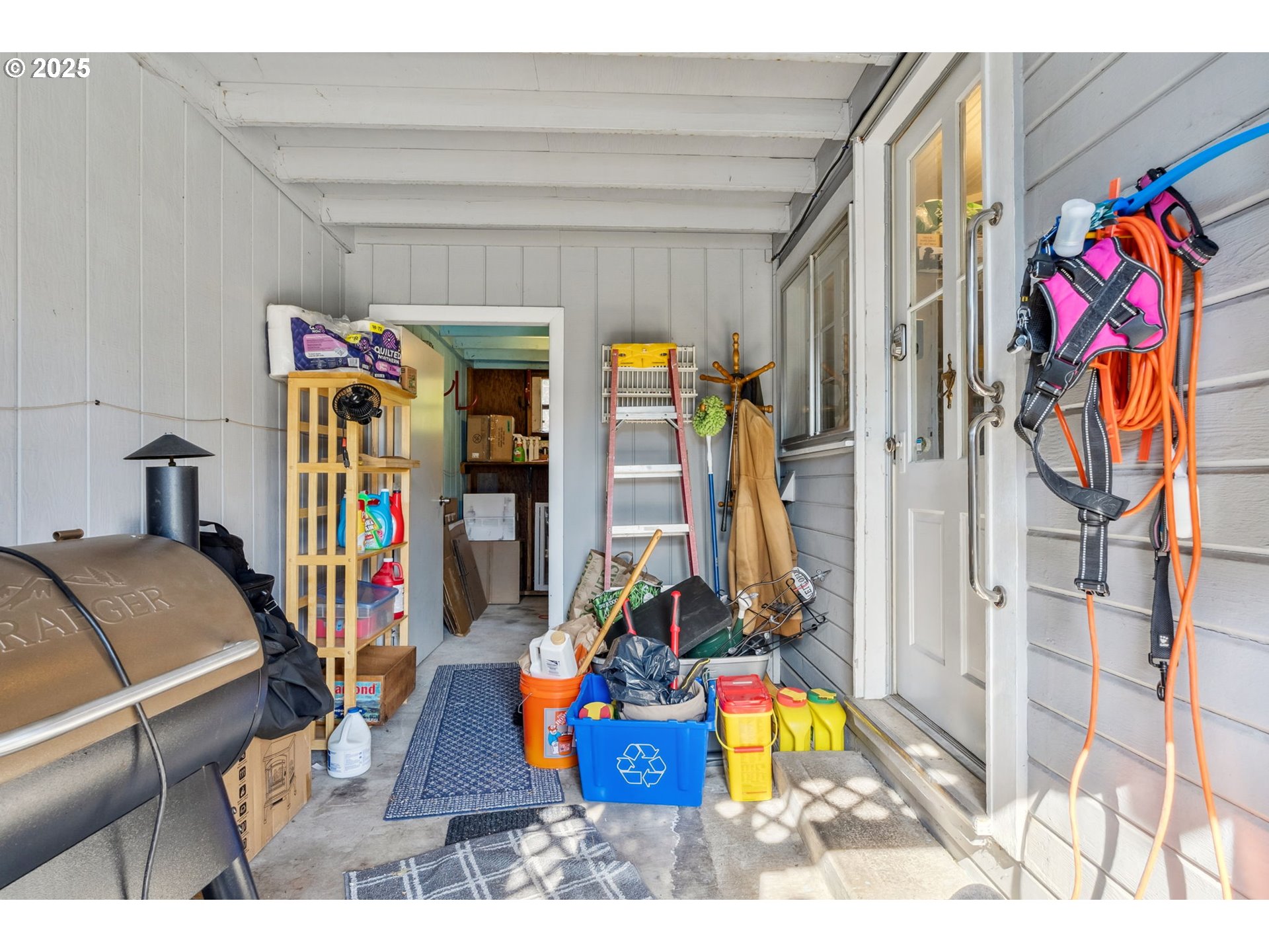 1108 9th Street Hood River, OR 97031 - Photo 33 of 44 a living room with furniture and a flat screen tv