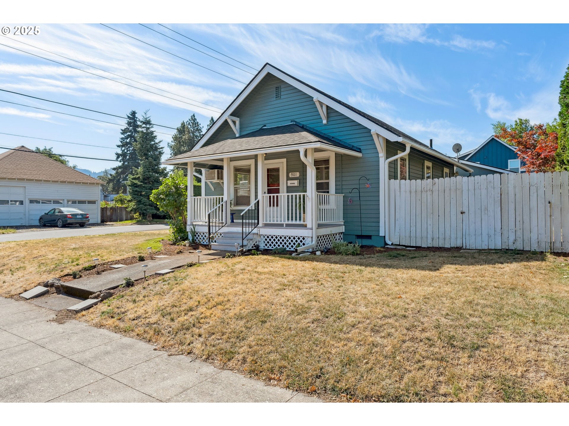 1108 9th Street Hood River, OR 97031 - Photo 43 of 44 a front view of a house with a yard