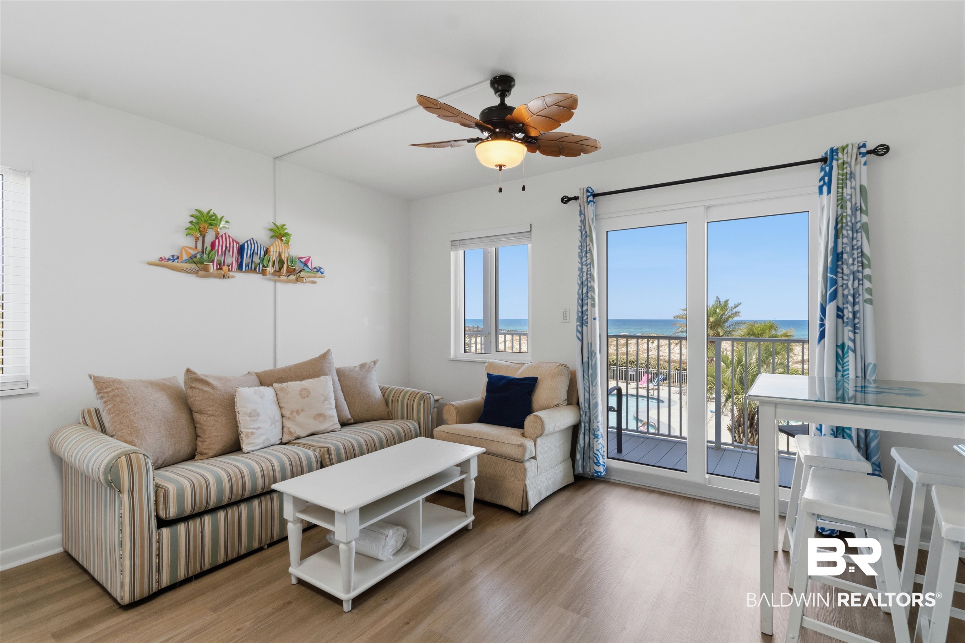 400 Plantation Road, Unit 3201 Gulf Shores, AL 36542 - Photo 4 of 35 Unit improvements done in 2021 - updated Vinyl Flooring, Stainless Appliances, Tiled Backsplash, HVAC. Unit has storm rated new sliding door and windows.