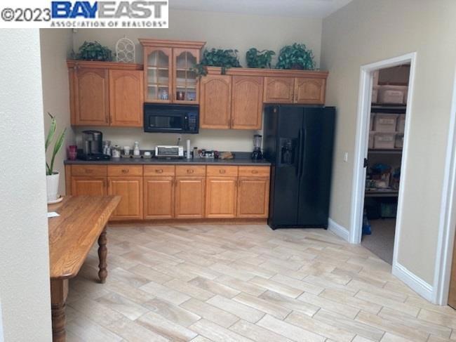 4749 Bennett Drive Livermore, CA 94551 - Photo 12 of 27 an empty room with wooden floor and cabinet