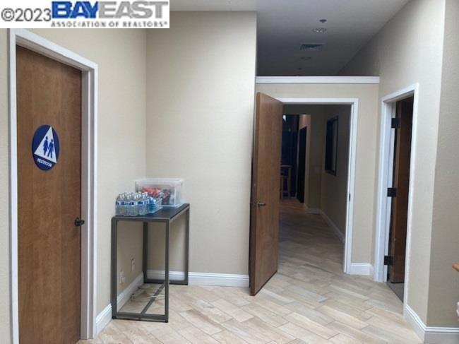 4749 Bennett Drive Livermore, CA 94551 - Photo 14 of 27 a view of a hallway that has painting on the wall