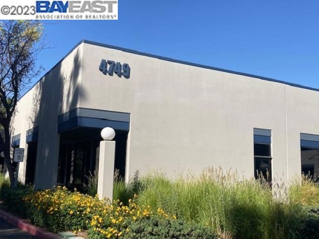 4749 Bennett Drive Livermore, CA 94551 - Photo 23 of 27 a view of a building with potted plants
