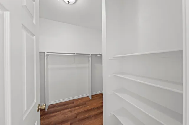 a view of an empty walk in closet