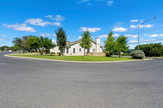 a view of a house and a street view