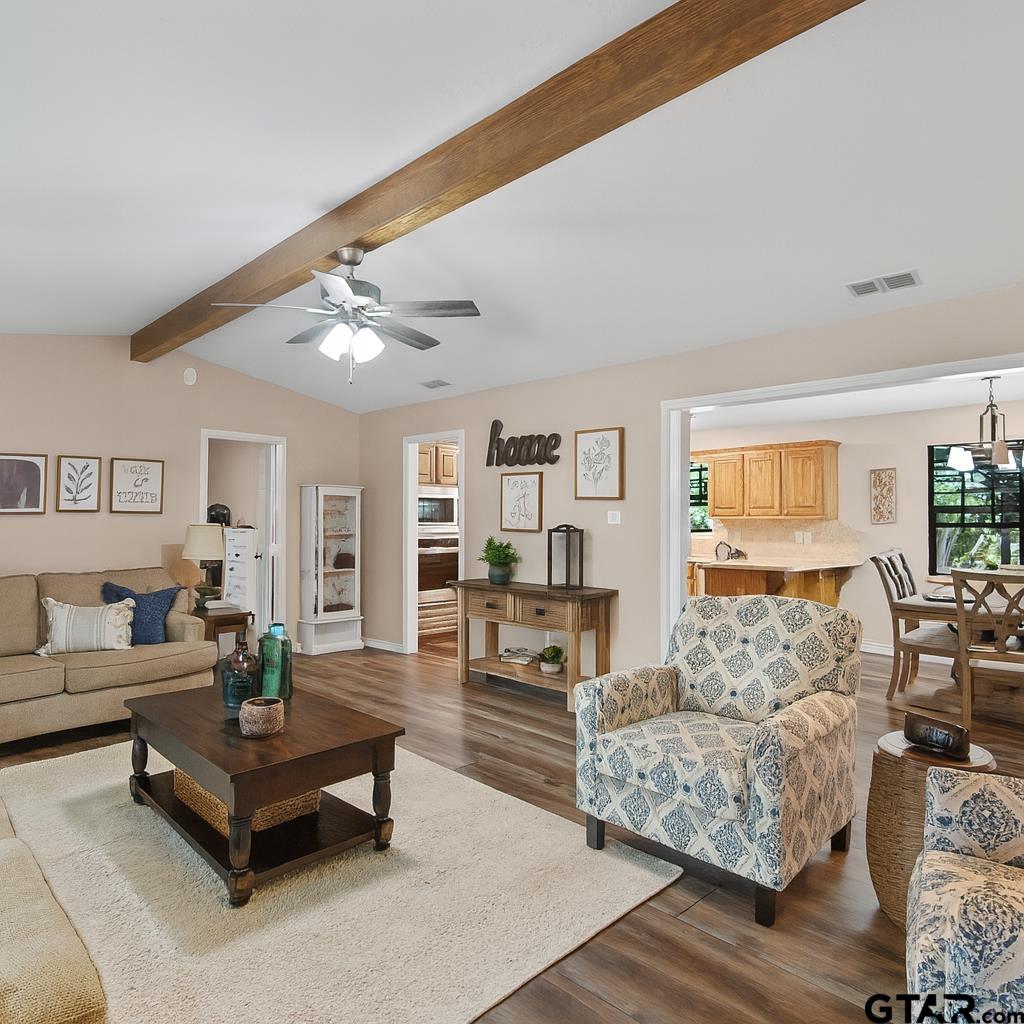 1832 FM 2906 Longview, TX 75603 - Photo 3 of 42 a living room with furniture and wooden floor