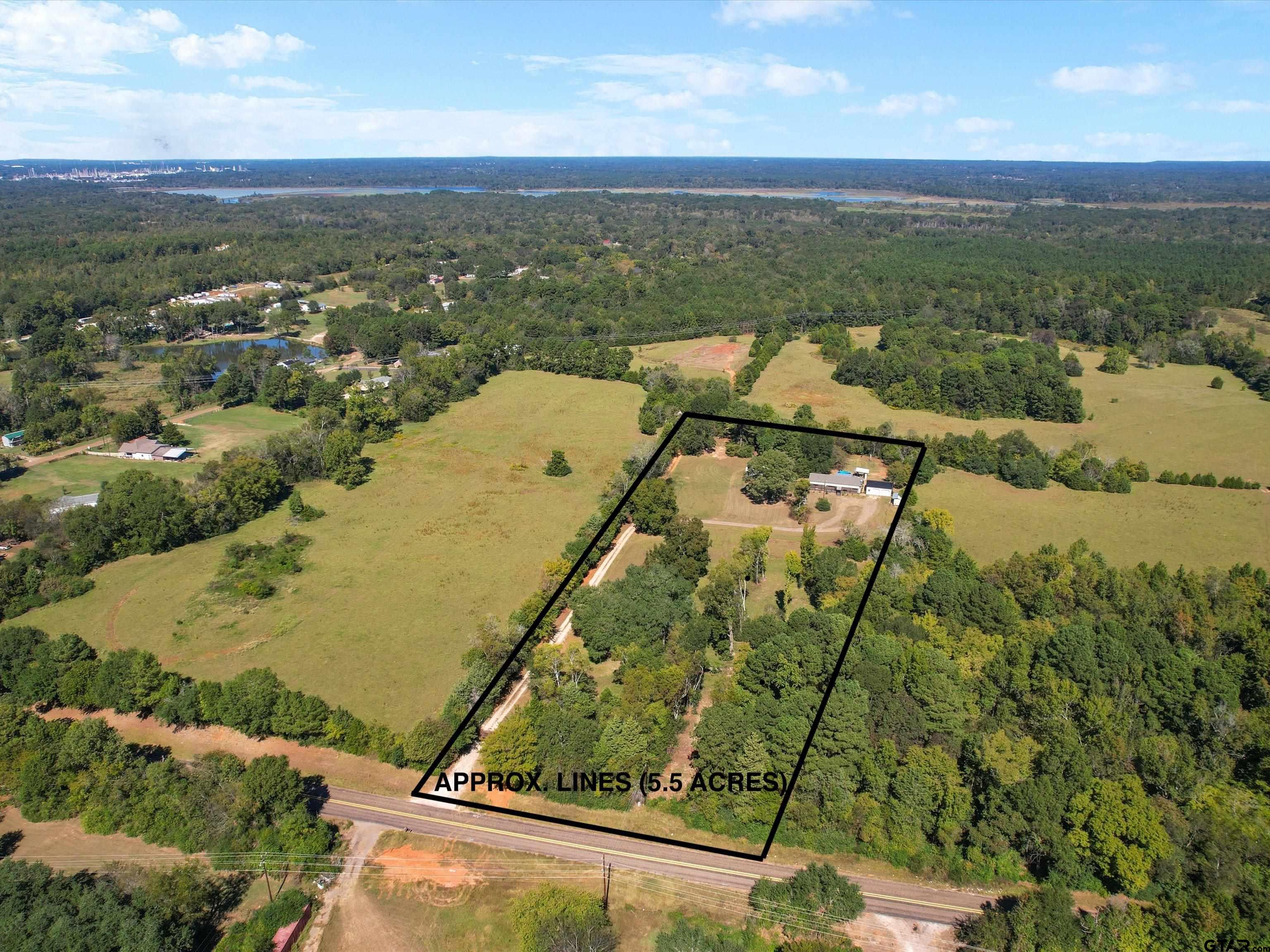 1832 FM 2906 Longview, TX 75603 - Photo 41 of 42 an aerial view of residential houses with outdoor space