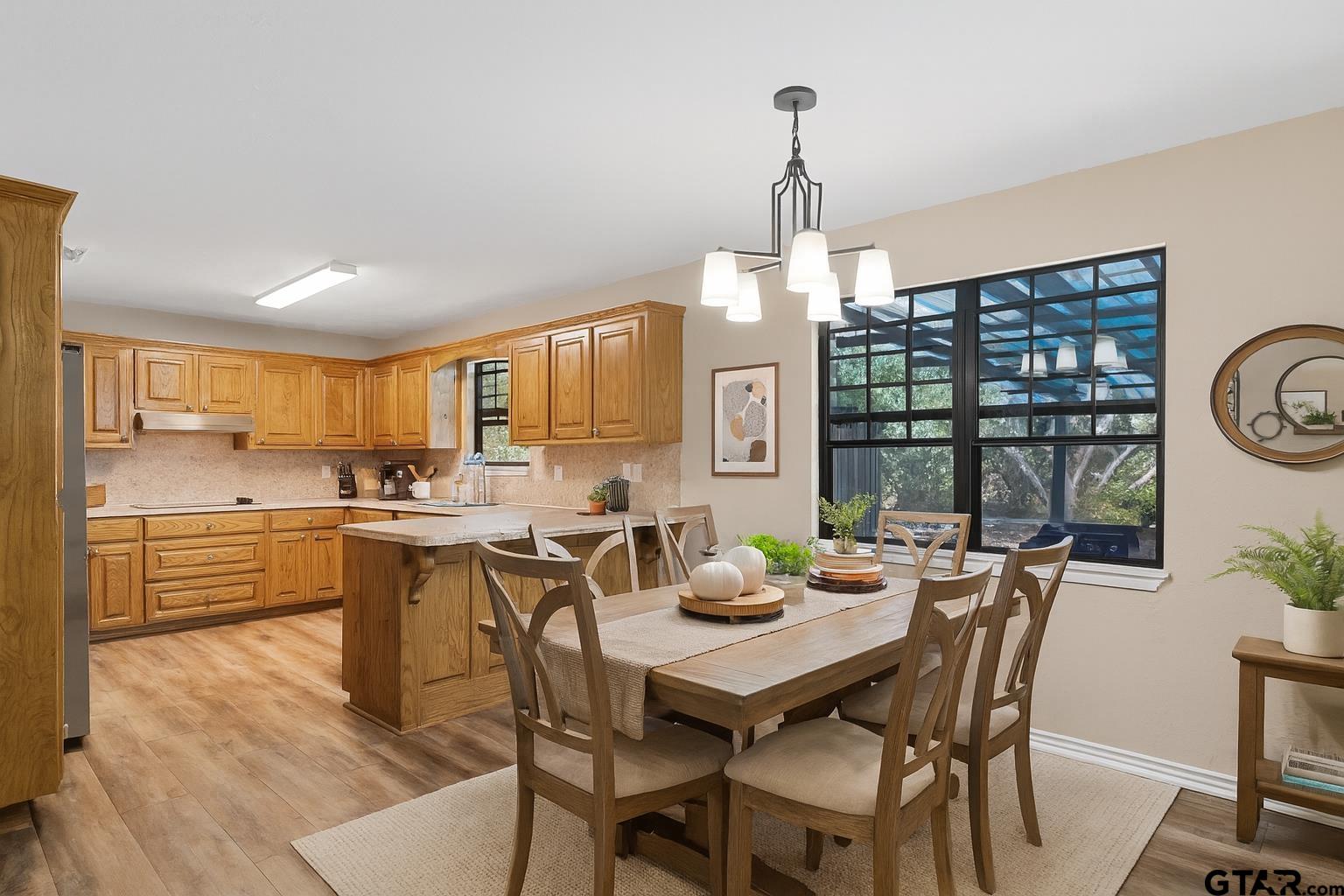 1832 FM 2906 Longview, TX 75603 - Photo 8 of 42 a view of a dining room with furniture window and outside view