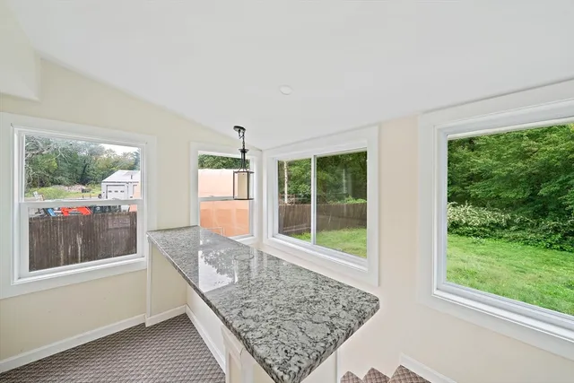 a living room with large windows