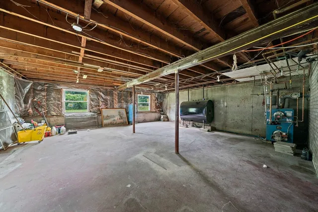 a view of a room with wooden walls