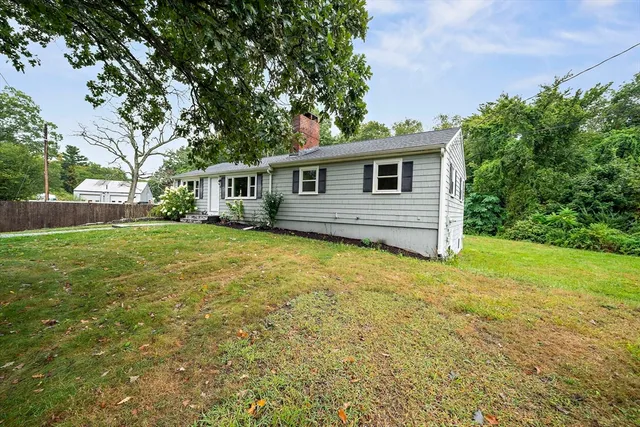 a house view with a garden space