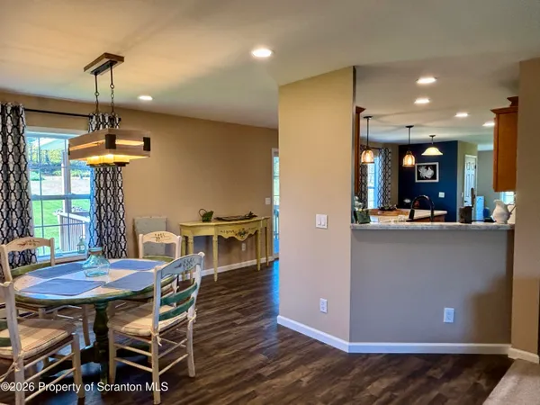 a view of a dining room with furniture