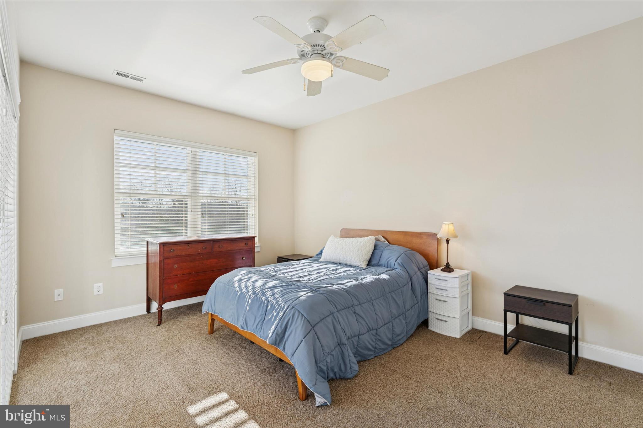 124 Bucktown Xing Road Pottstown, PA 19465 - Photo 12 of 15 a bedroom with a bed and a window