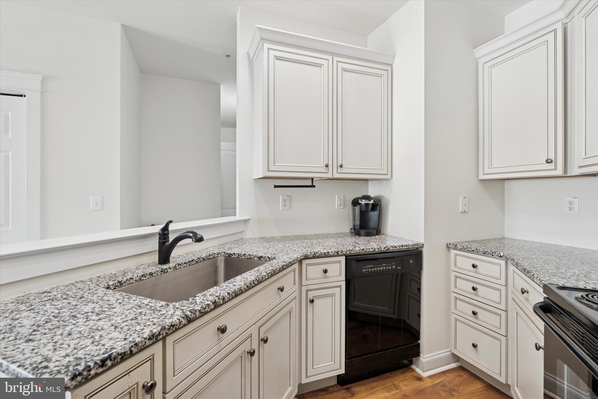 124 Bucktown Xing Road Pottstown, PA 19465 - Photo 9 of 15 a kitchen with stainless steel appliances granite countertop a sink stove and cabinets